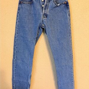 Levi's Light Blue Denim Jeans with Red Logo Tag